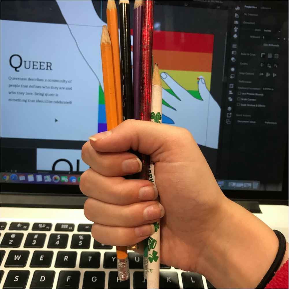 Reference photo of hand holding pencils